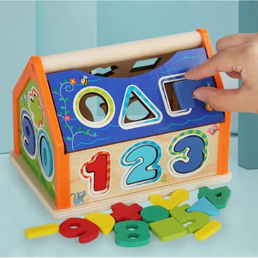 Wooden Interlocking Toy House With Numbers Geometric Shapes And Signs